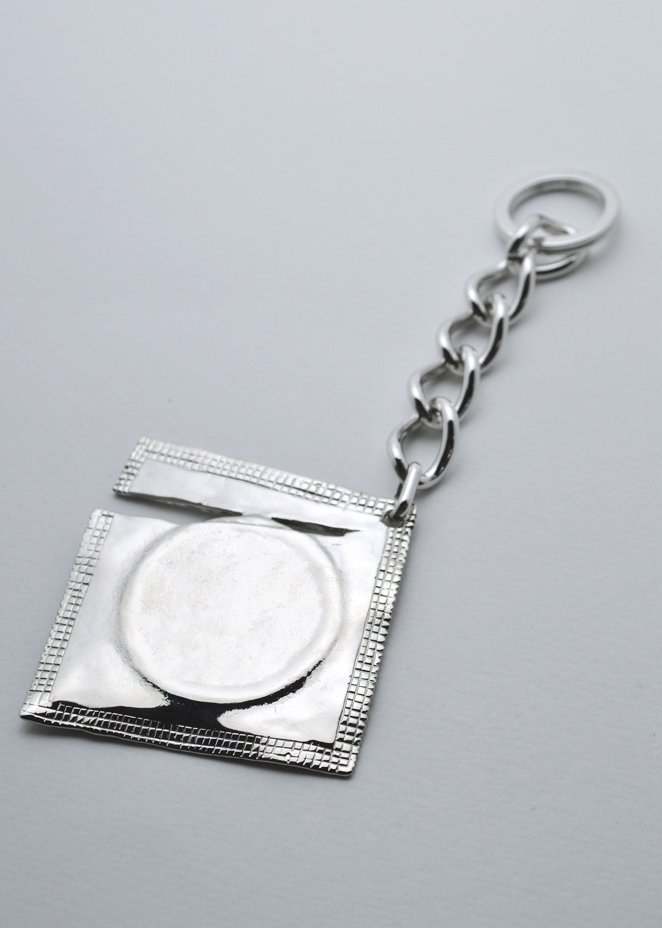 Ripped Raincoat Keyring